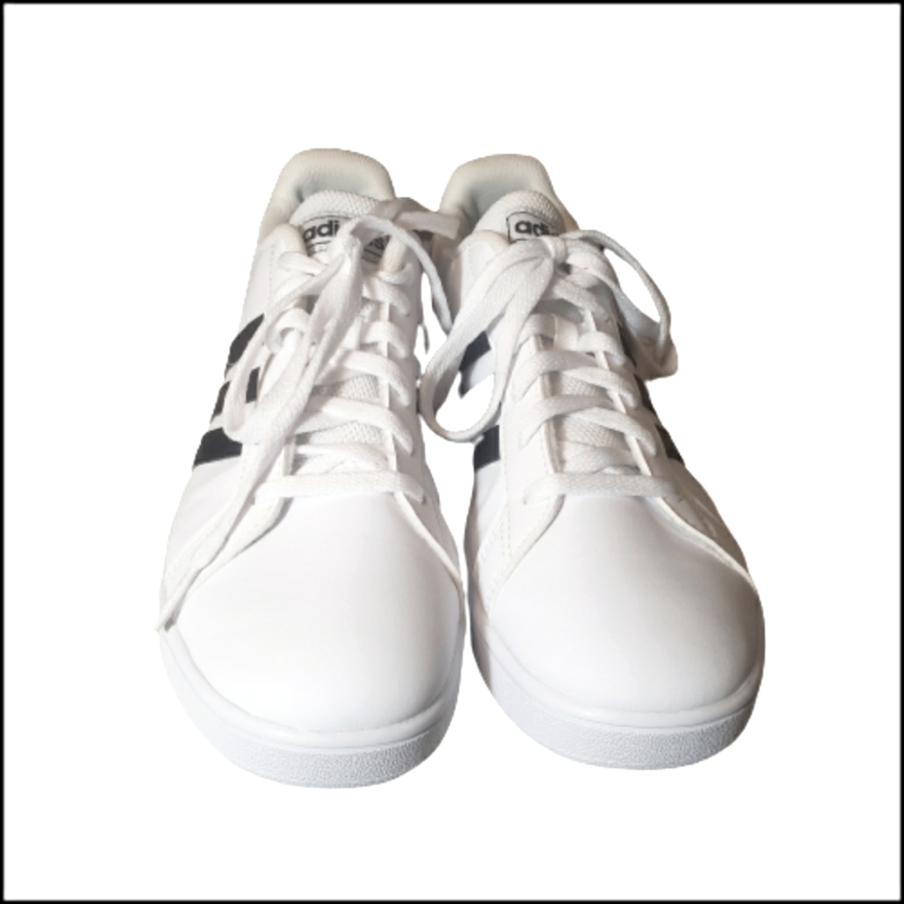 Size 5 white and black Adidas